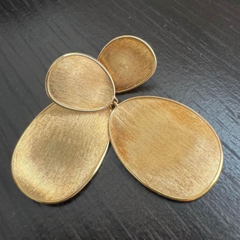 Marco Bicego drop earrings.